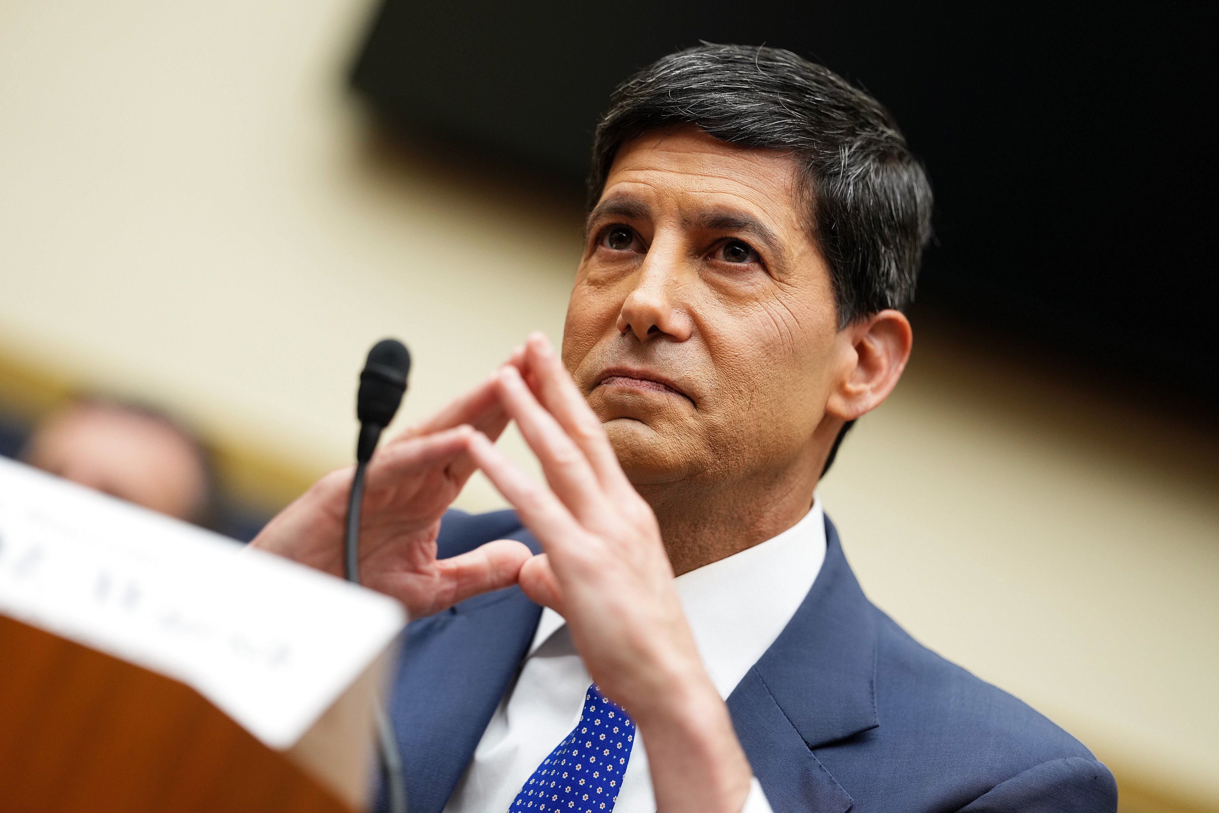 A divided Federal Reserve holds interest rates steady despite high inflation