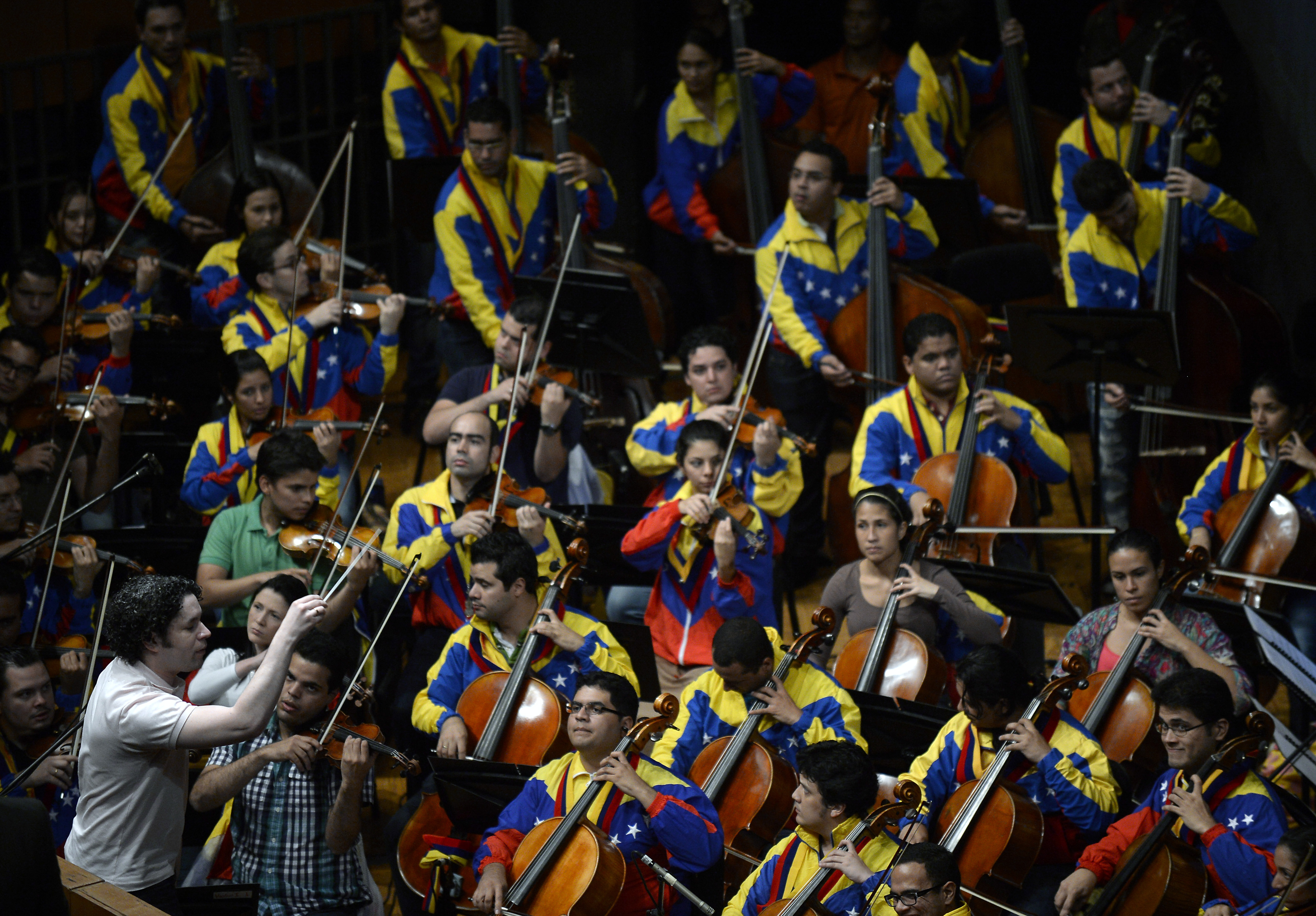 As Venezuela future remains uncertain , its symphony orchestra reaches a new milestone