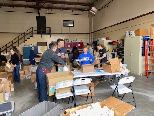 High Schoolers pack boxes of medical supplies for a good cause - Vimarsana News