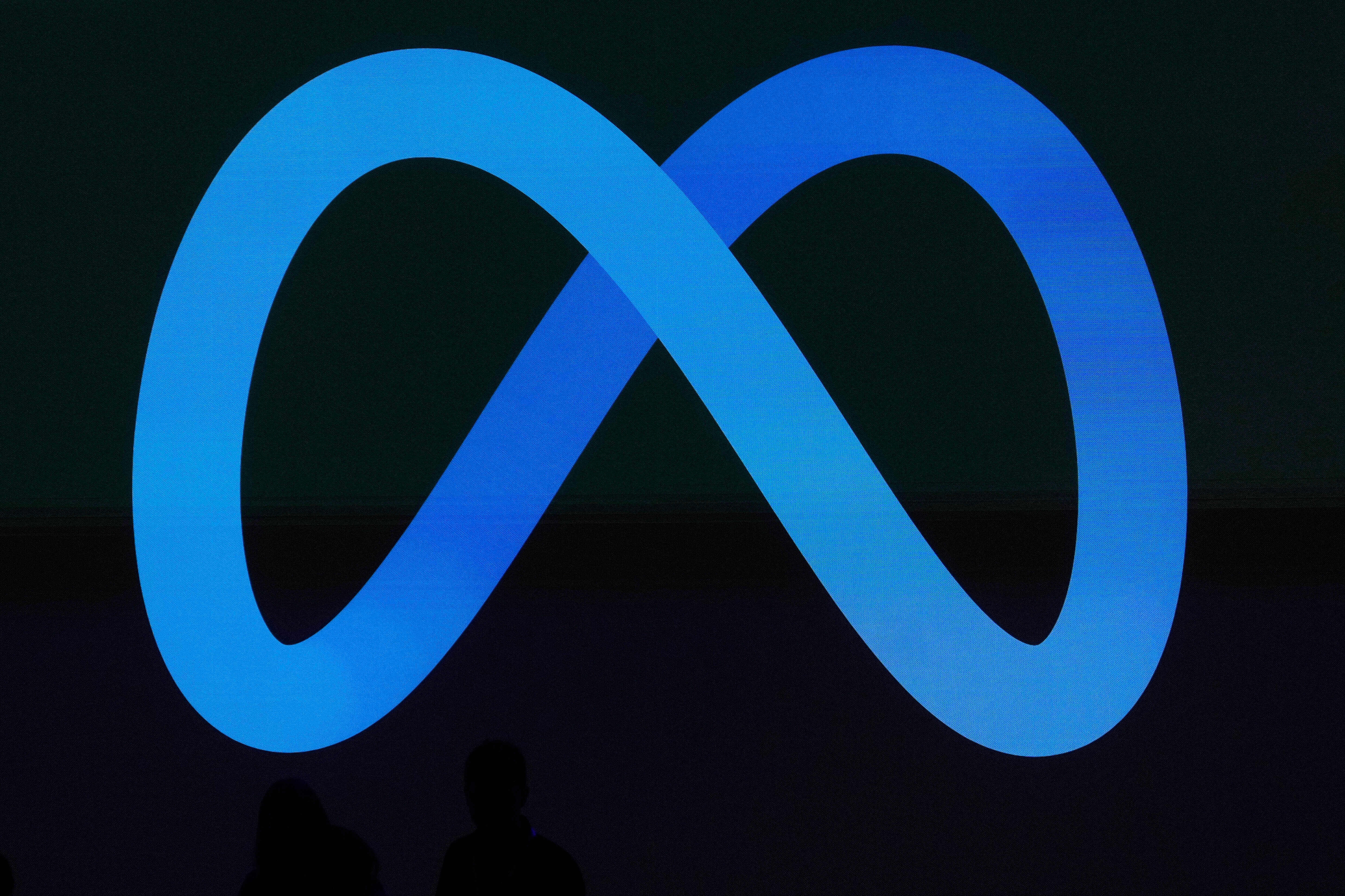 a blue infinity symbol on a black background